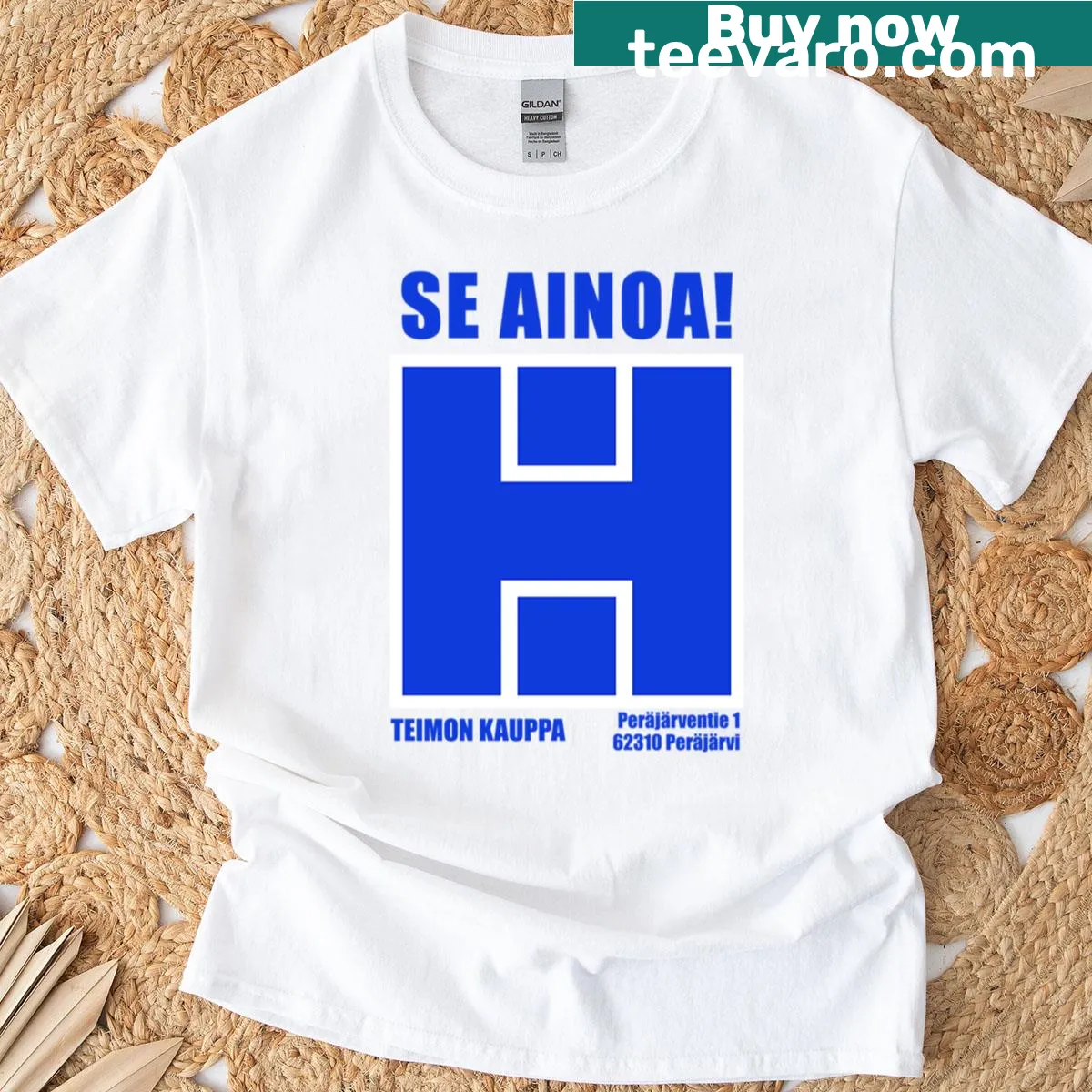 Minimalist typography design with 'Teimon Kauppa' on t-shirt — on a men's t-shirt