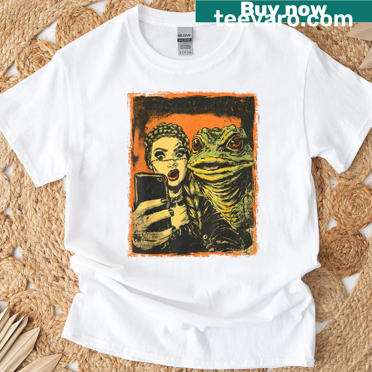 Graphic T-shirt featuring a toad monster and goth girl in a comic style — on a men's t-shirt