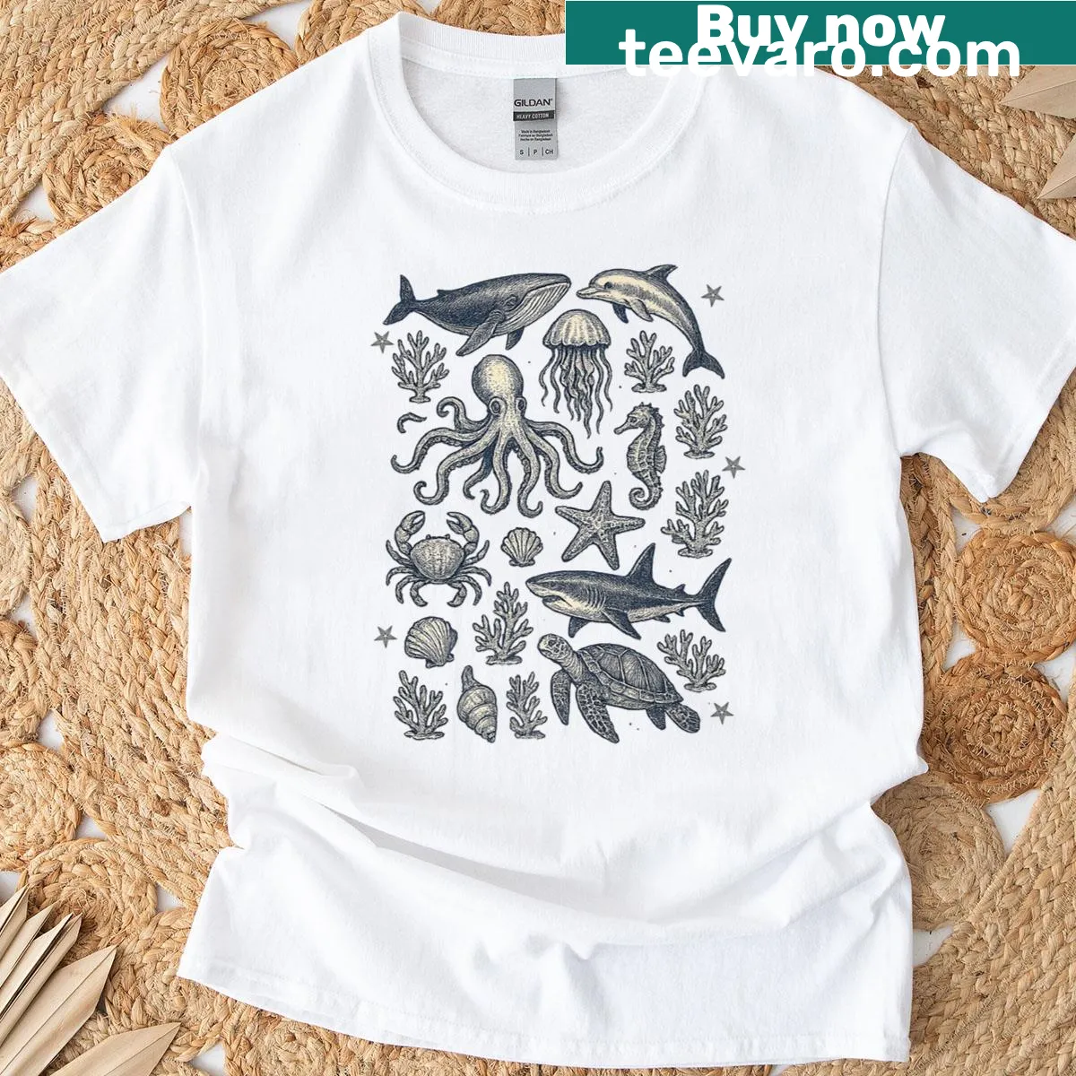 Vintage-style T-shirt with tattoo graphics of sea animals and ocean themes. — on a men's t-shirt