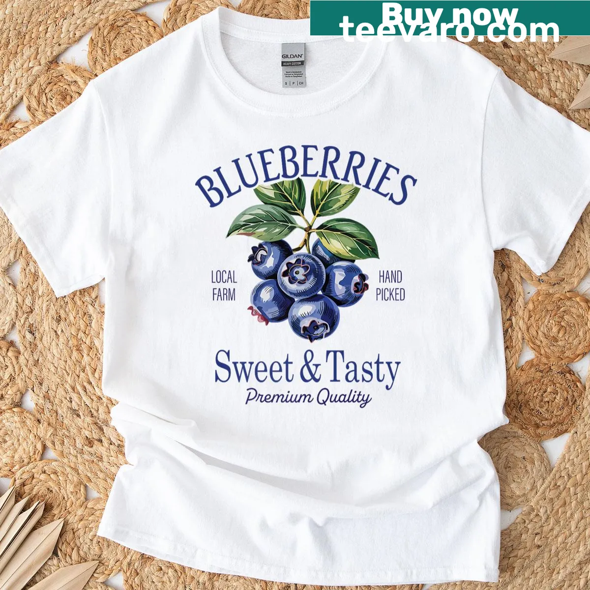 Vintage T-shirt featuring a retro illustration of blueberries — on a men's t-shirt