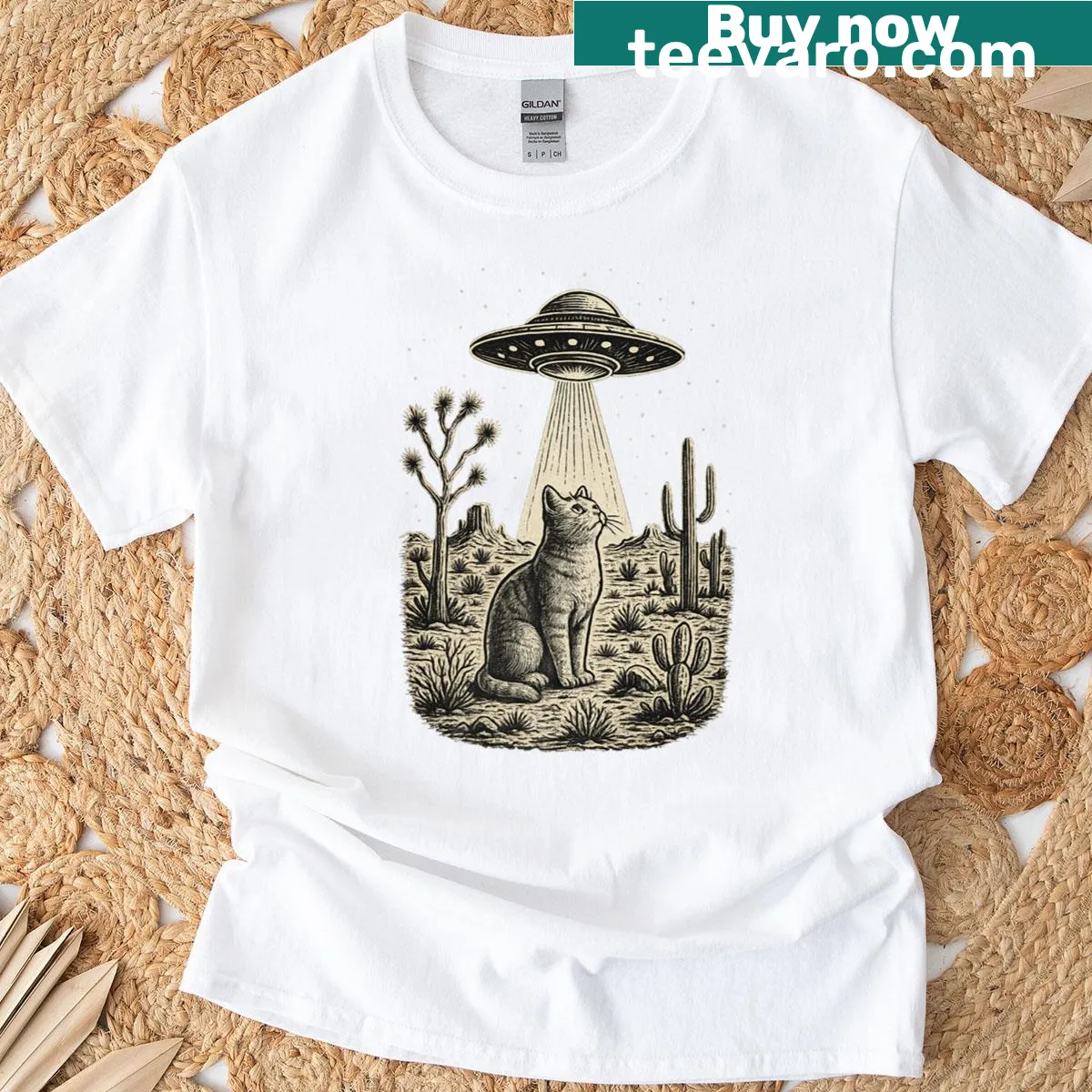 Retro cowboy cat on a UFO in a desert graphic t-shirt — on a men's t-shirt