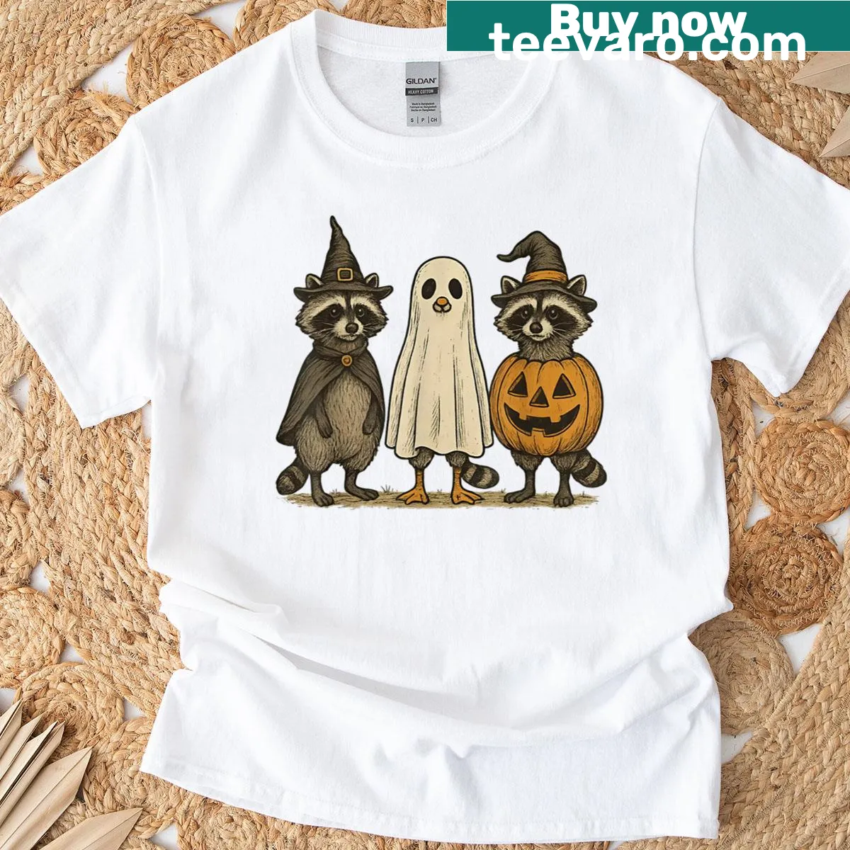 Cartoon Halloween T-shirt featuring a ghost raccoon and goose. — on a men's t-shirt