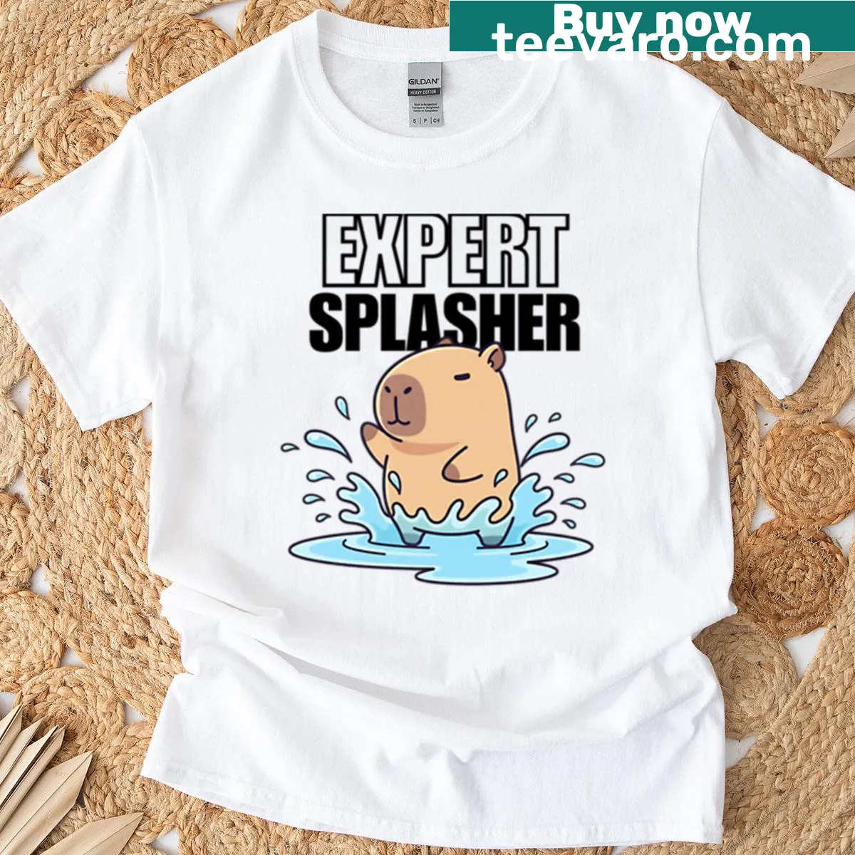 Charming capybara t-shirt with playful splashing graphic — on a men's t-shirt