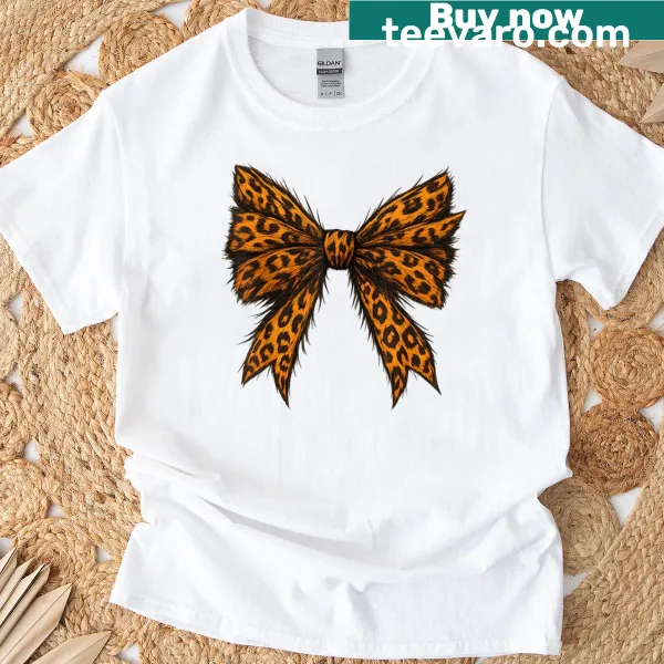Cute pumpkin shirt with leopard print and bow illustration.