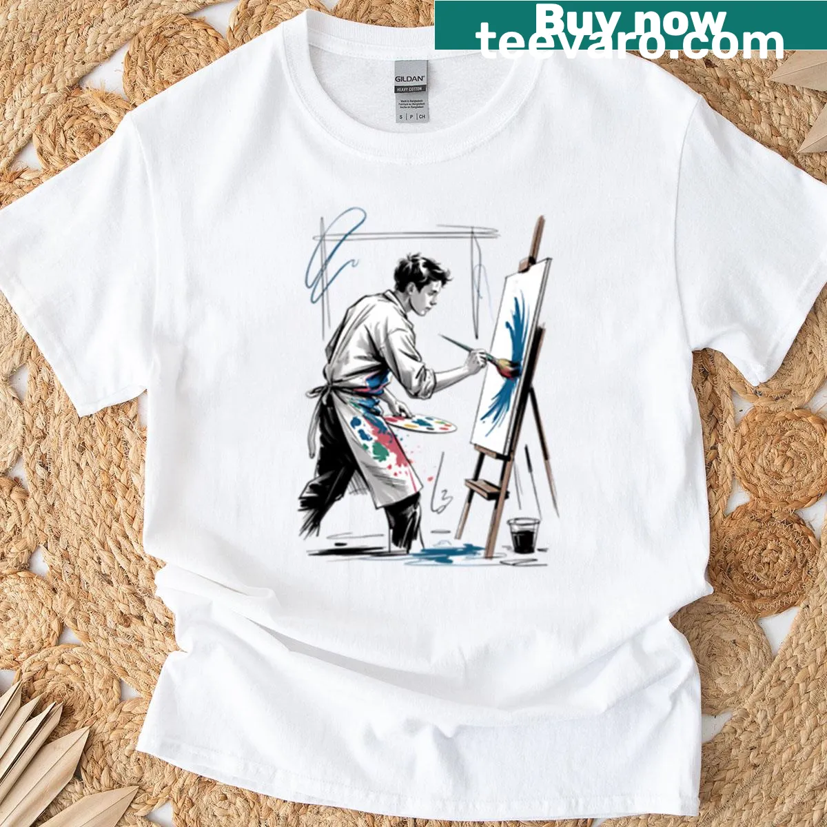 Artist-themed T-shirt with illustration of male painter at canvas — on a men's t-shirt