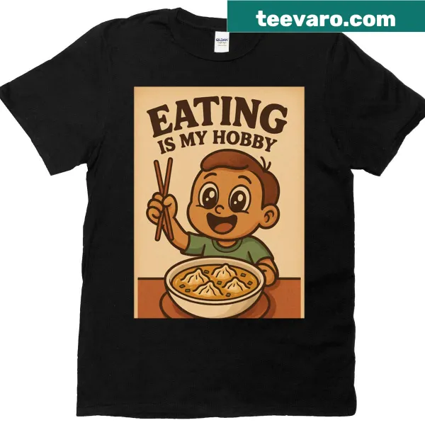 Boy's T-shirt stating 'Eating Is My Hobby' in playful typography