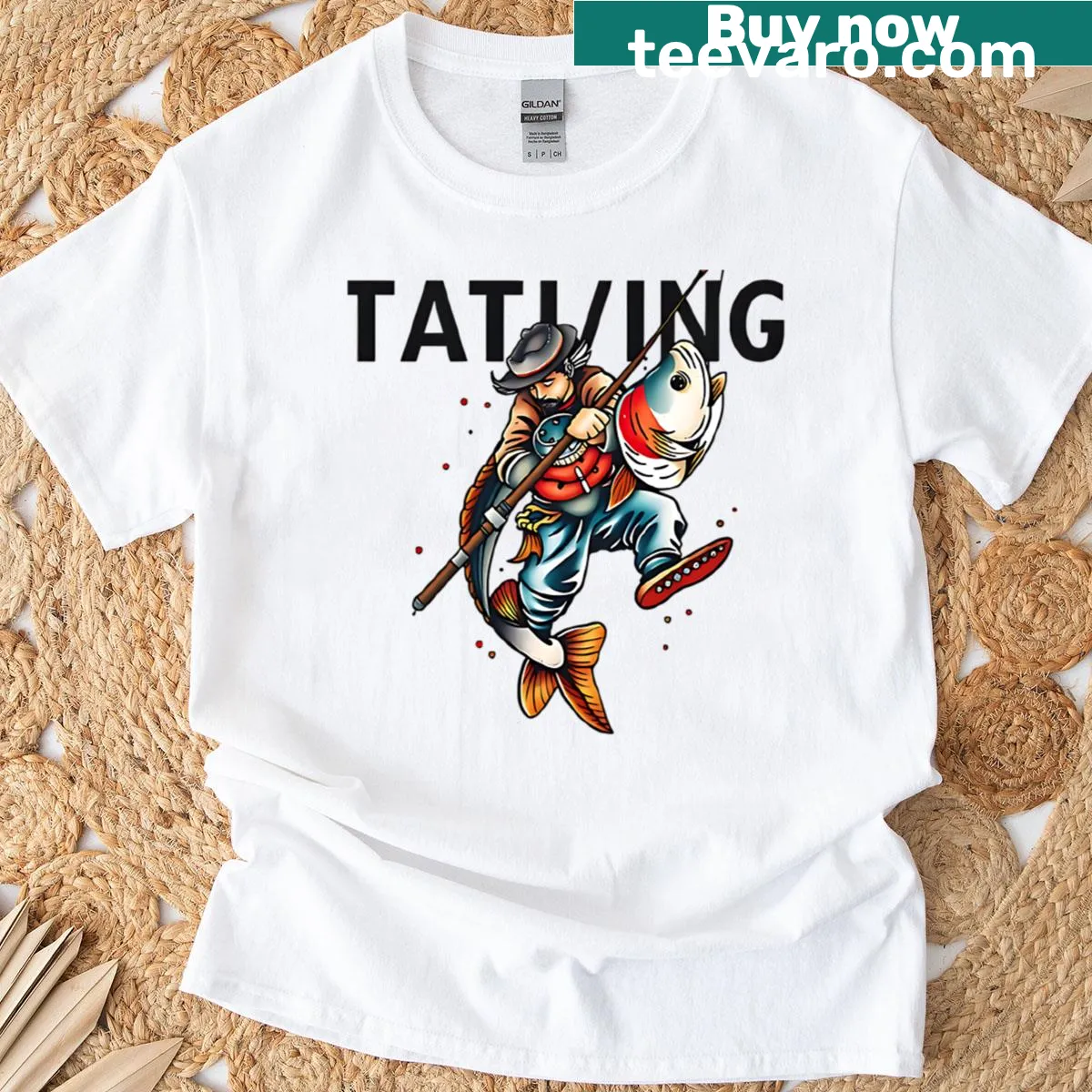 T-shirt featuring an illustration of a fisherman catching a big fish — on a men's t-shirt