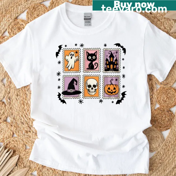 Halloween t-shirt featuring a ghost cat with pumpkins and a haunted house