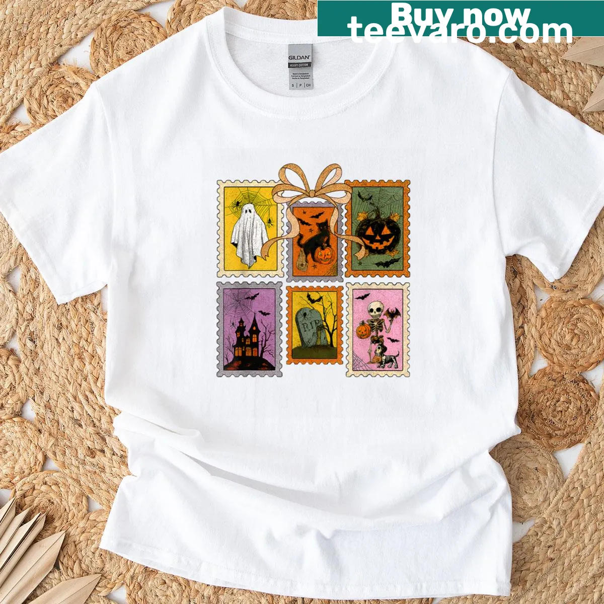 Distressed Halloween T-shirt featuring ghost, pumpkin, and bats design — on a men's t-shirt