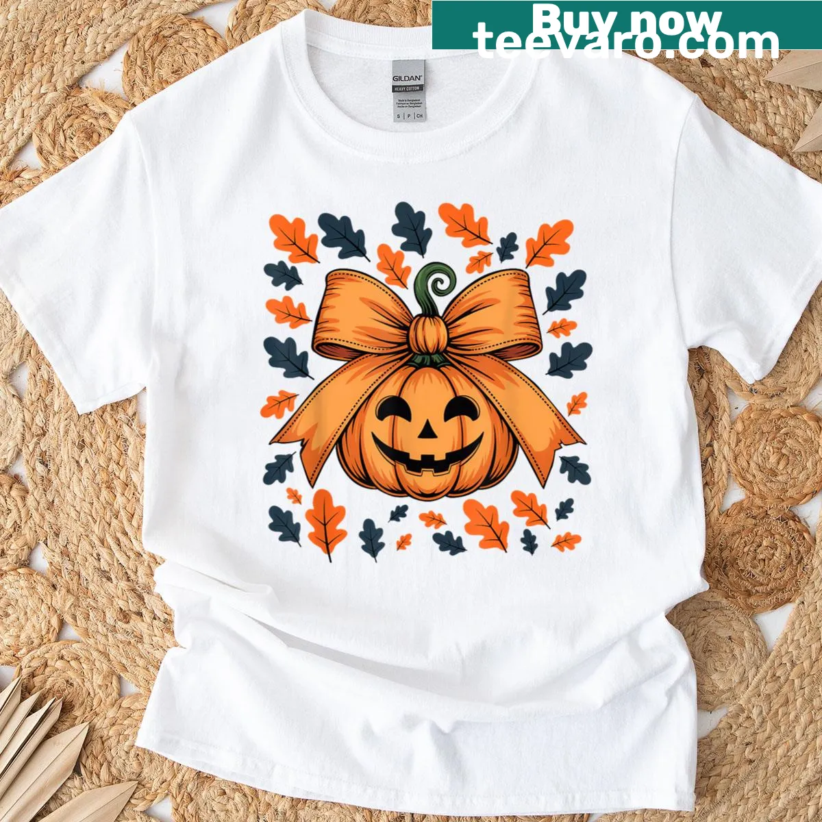 Halloween t-shirt featuring a jack-o-lantern with a bow and falling leaves — on a men's t-shirt