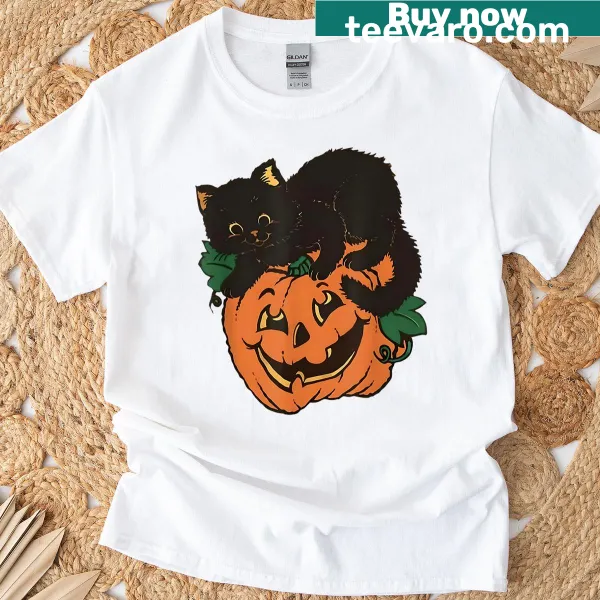 Vintage-style Halloween T-shirt with black cat and pumpkin graphics.