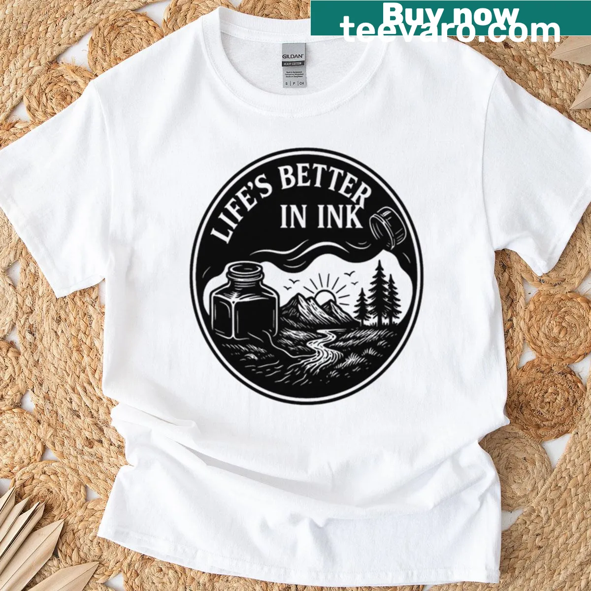 Vintage design T-shirt featuring an ink bottle and landscape graphic. — on a men's t-shirt
