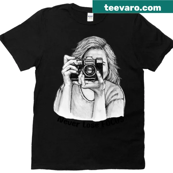 T-shirt with graphic of girl adjusting a camera
