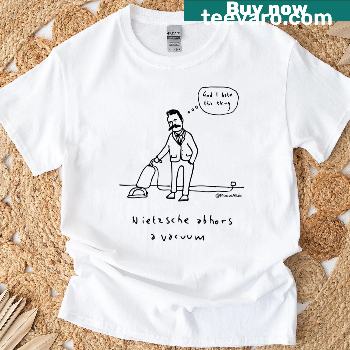 Black print t-shirt with the text 'Nietzsche Abhors A Vacuum' — on a men's t-shirt