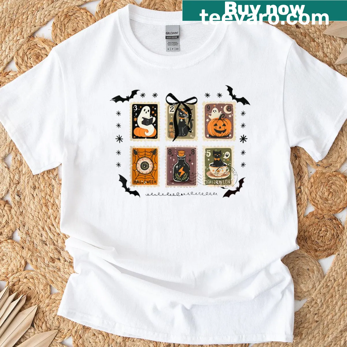 Retro Halloween t-shirt featuring a pumpkin, ghost, and black cat in stamp style — on a men's t-shirt
