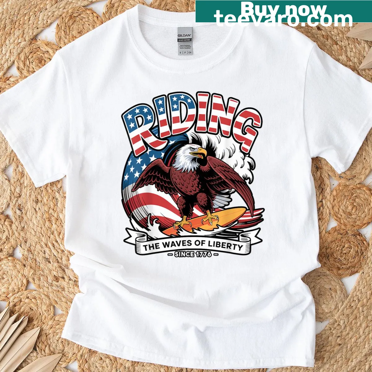 Eagle surfing on waves with a patriotic theme — on a men's t-shirt