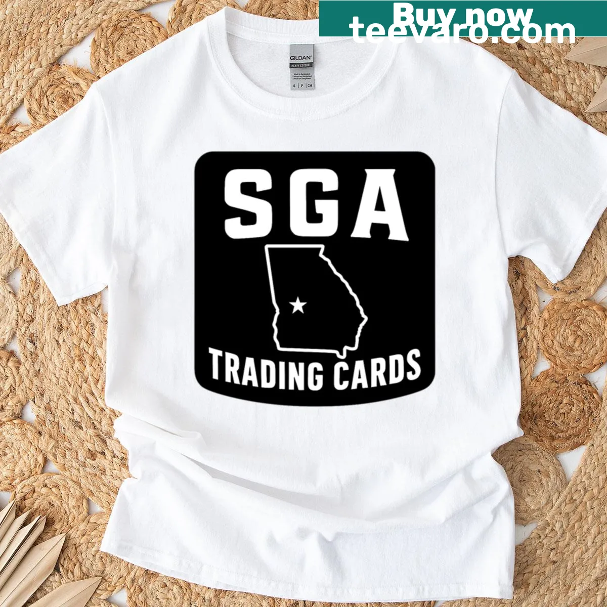 Monochrome badge logo design for Sga Trading Cards. — on a men's t-shirt
