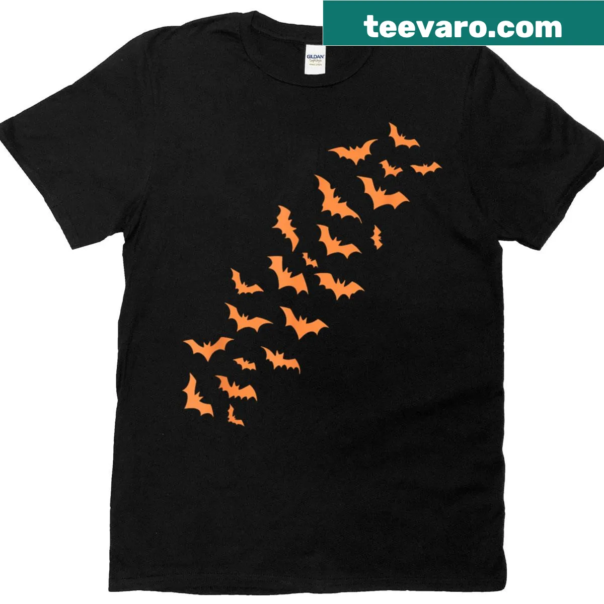 Halloween T-shirt featuring a haunted house and bats design printed on front and back. — on a men's t-shirt