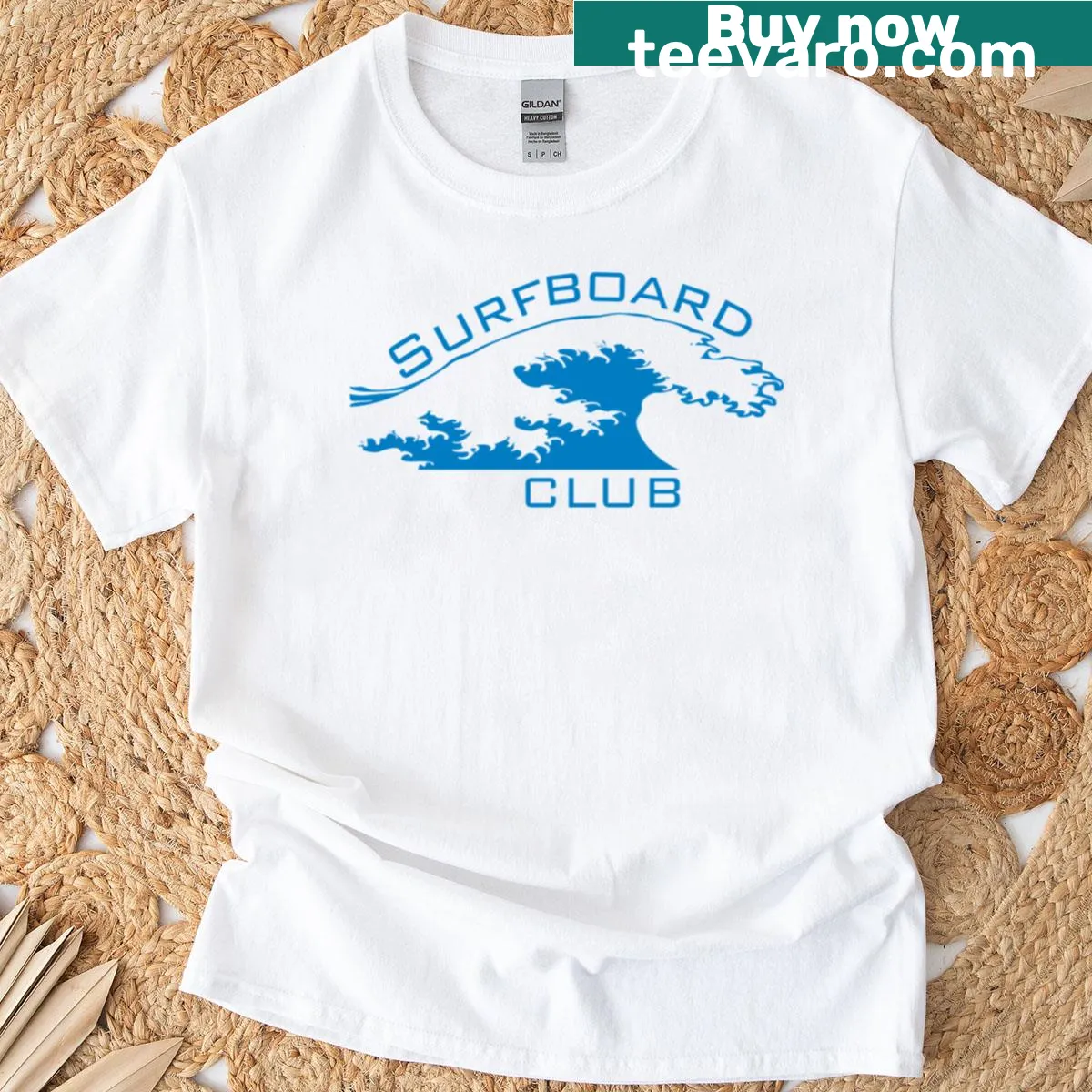 Beach-themed shirt with surfboard and ocean wave design — on a men's t-shirt