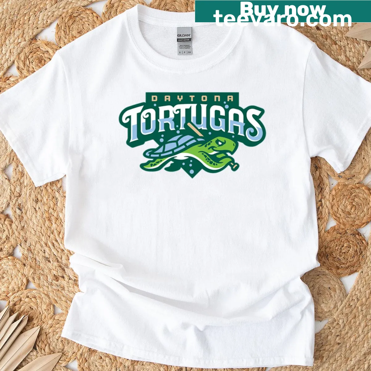 Daytona Tortugas T-shirt featuring playful team logo illustration — on a men's t-shirt