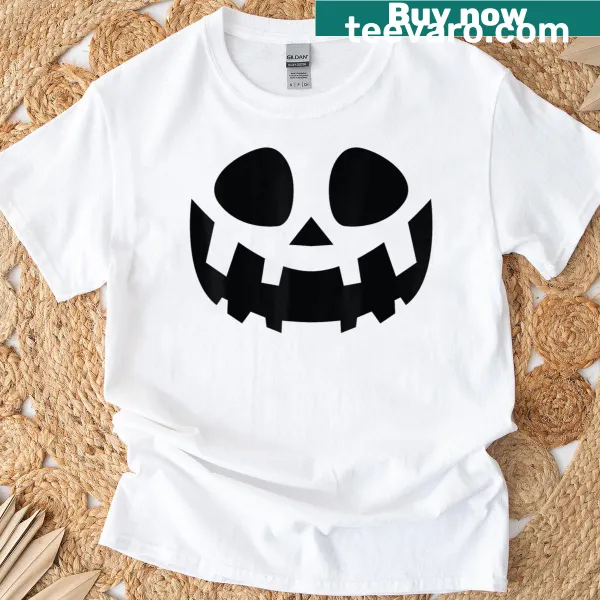 Vintage Halloween T-shirt featuring a pumpkin jack-o'-lantern face