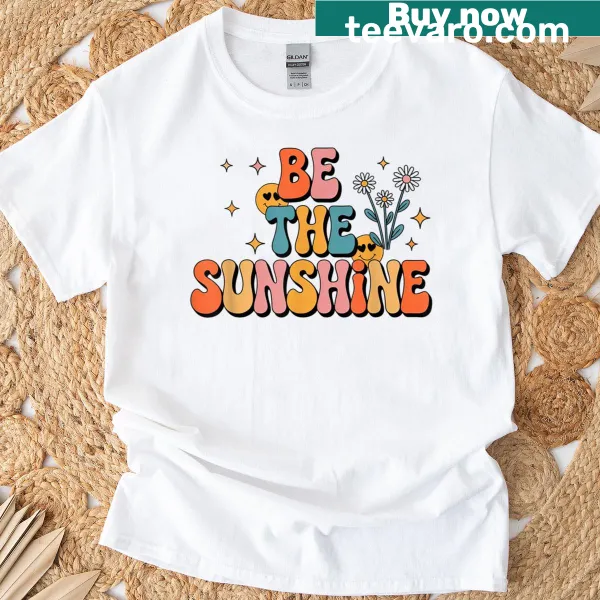 Vintage teacher t-shirt with 'Be The Sunshine' motivational phrase