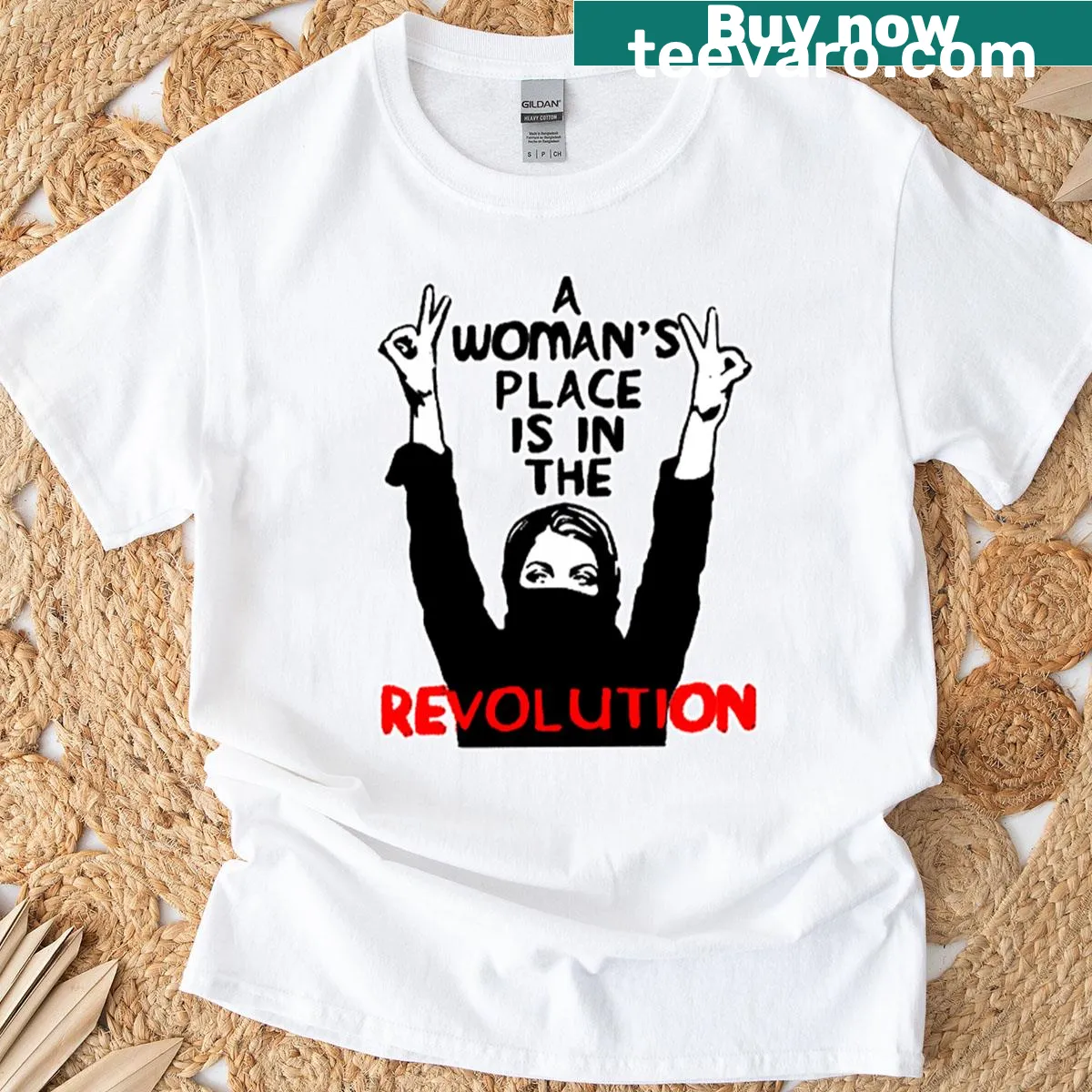 Empowerment t-shirt featuring the phrase 'A Woman's Place Is In The Revolution' — on a men's t-shirt