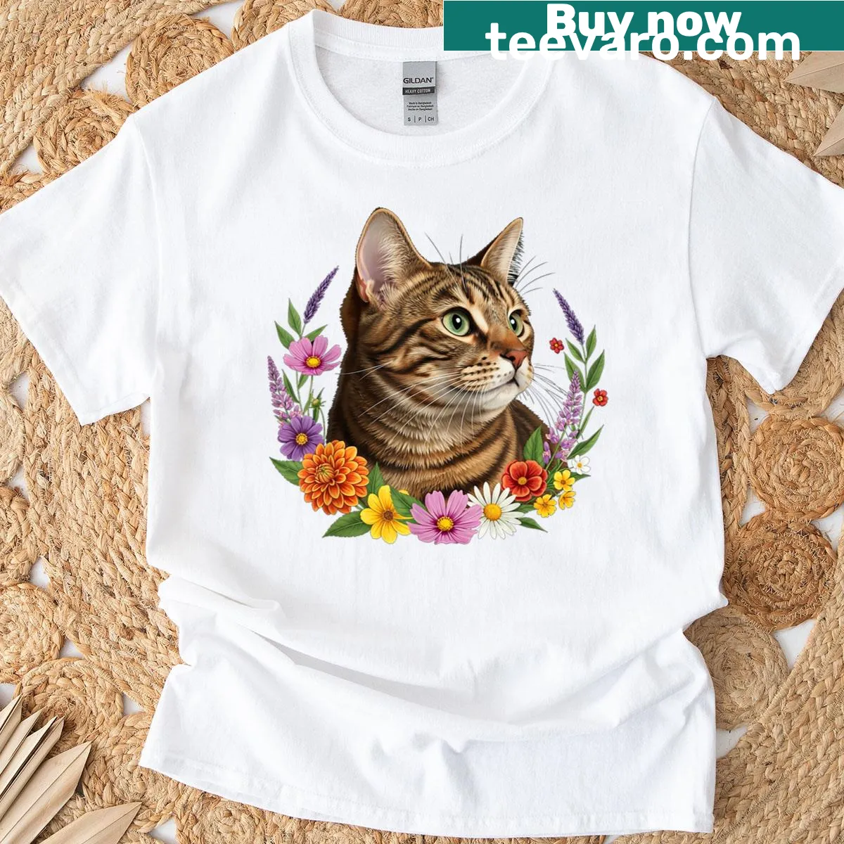Cute T-shirt featuring a kitten surrounded by floral designs. — on a men's t-shirt