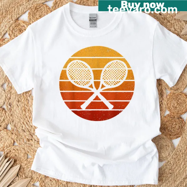 Retro 80s design of crossed tennis racquets and ball on T-shirt