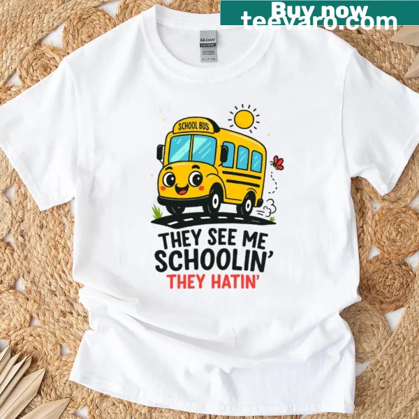 Cartoon school bus graphic with a funny slogan on a T-shirt