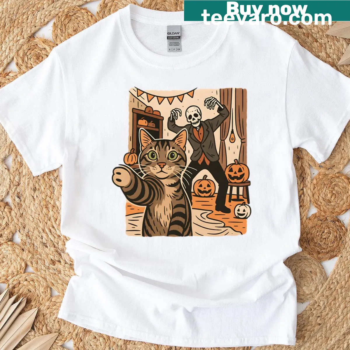 Cute tabby cat with skeleton and pumpkins for Halloween T-shirt — on a men's t-shirt