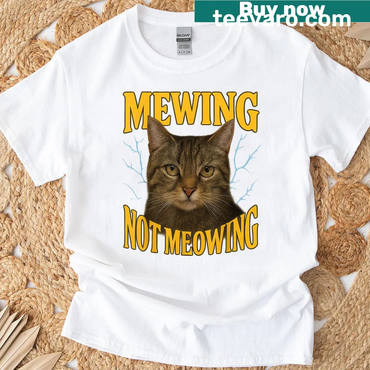 Funny cat meme T-shirt with the phrase 'mewing, not meowing' — on a men's t-shirt