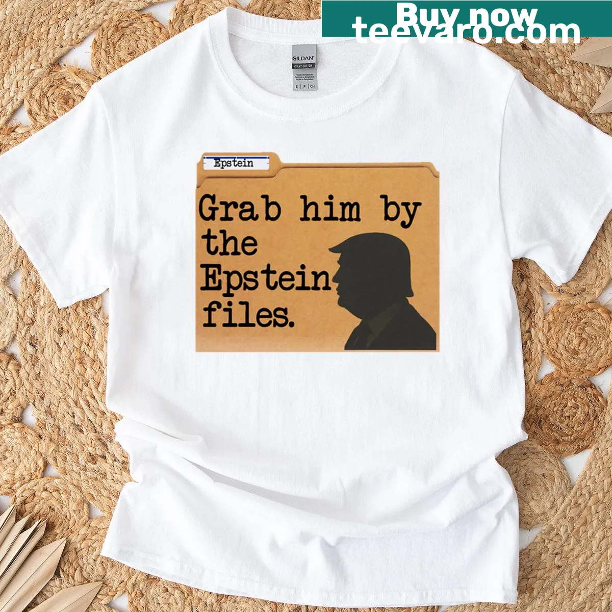 Oversized t-shirt with bold text 'Grab Him By The Epstein Files' — on a men's t-shirt