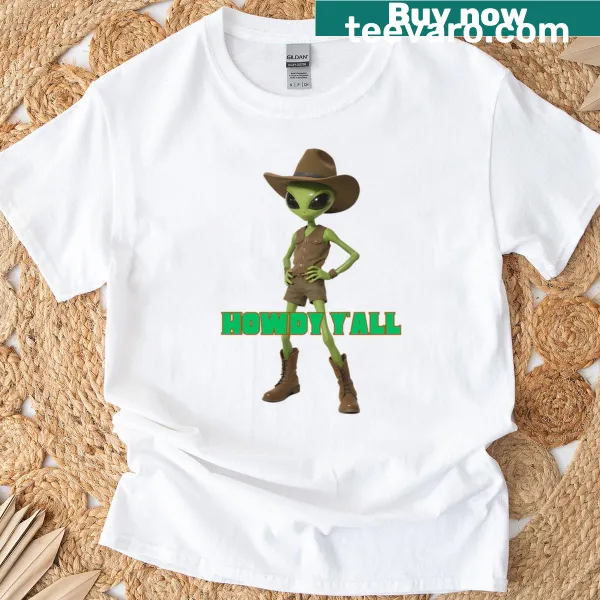 Cartoon alien cowboy t-shirt featuring a green alien in cowboy attire