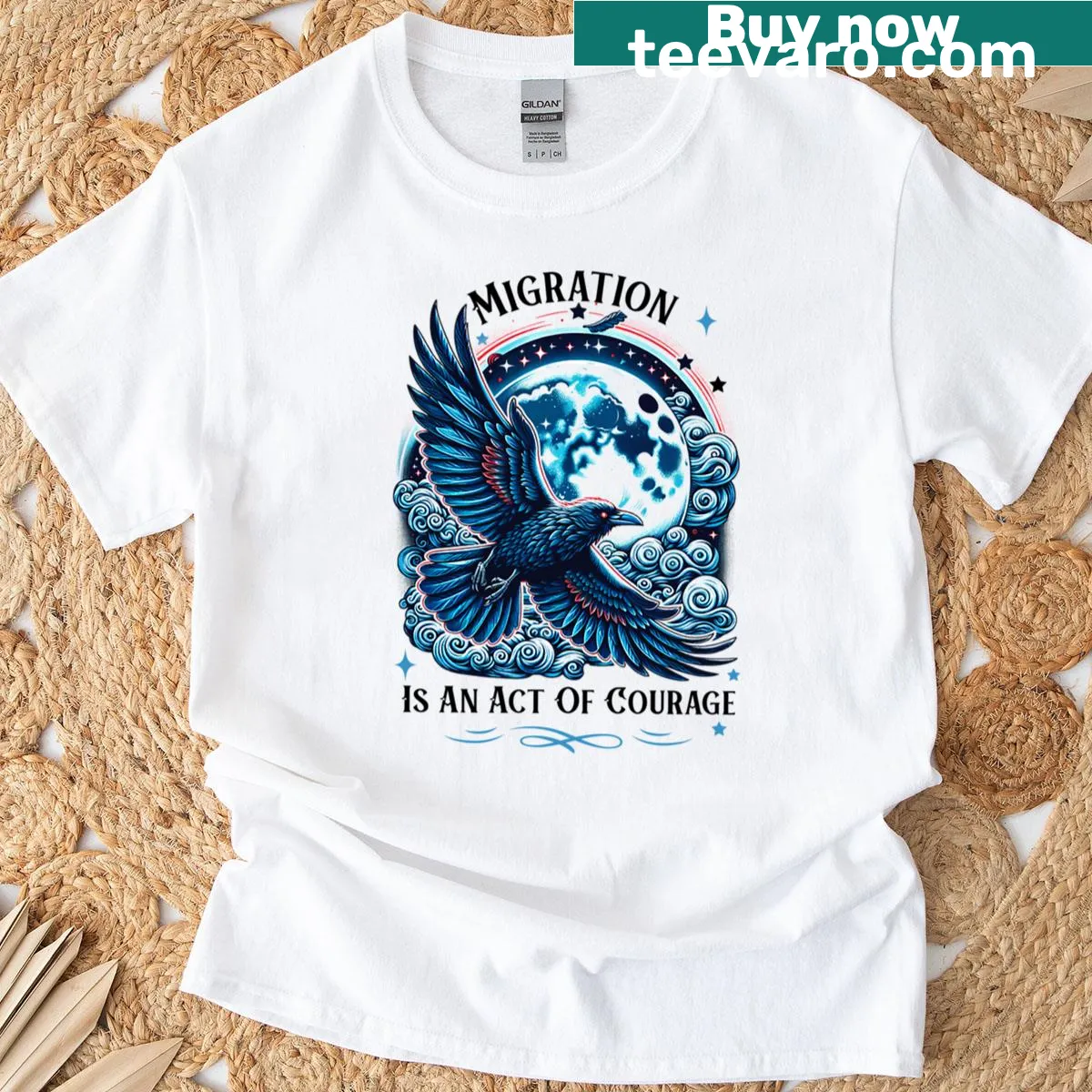 Oversized t-shirt with bold typography: Migration Is An Act Of Courage — on a men's t-shirt