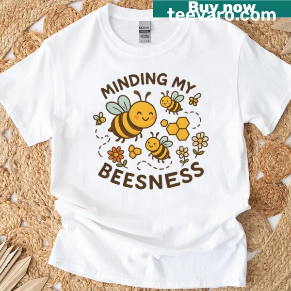 Cute t-shirt with Minding My Beesness pun and bee graphic