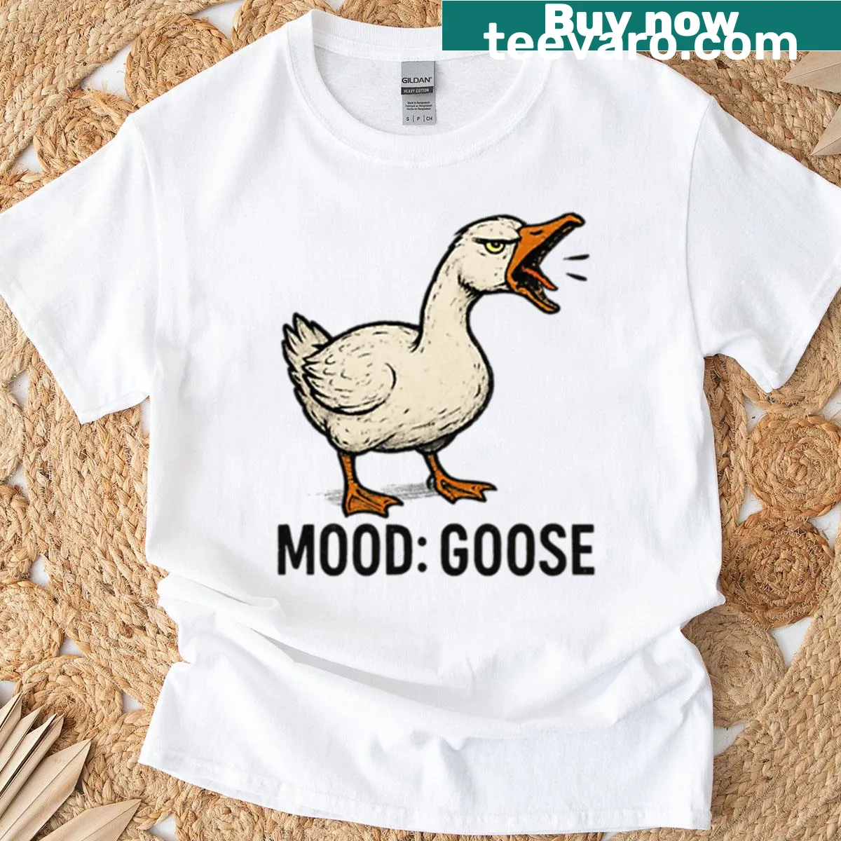 Cartoon t-shirt featuring a funny angry goose graphic — on a men's t-shirt