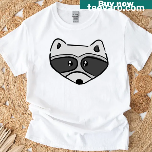 T-shirt featuring a cute illustration of a raccoon with a curious stare