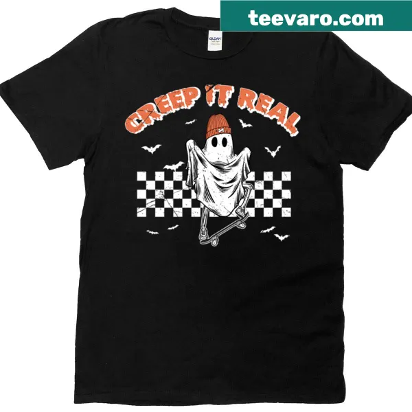 Retro-inspired Halloween T-shirt with a ghost and text 'Creep It Real'
