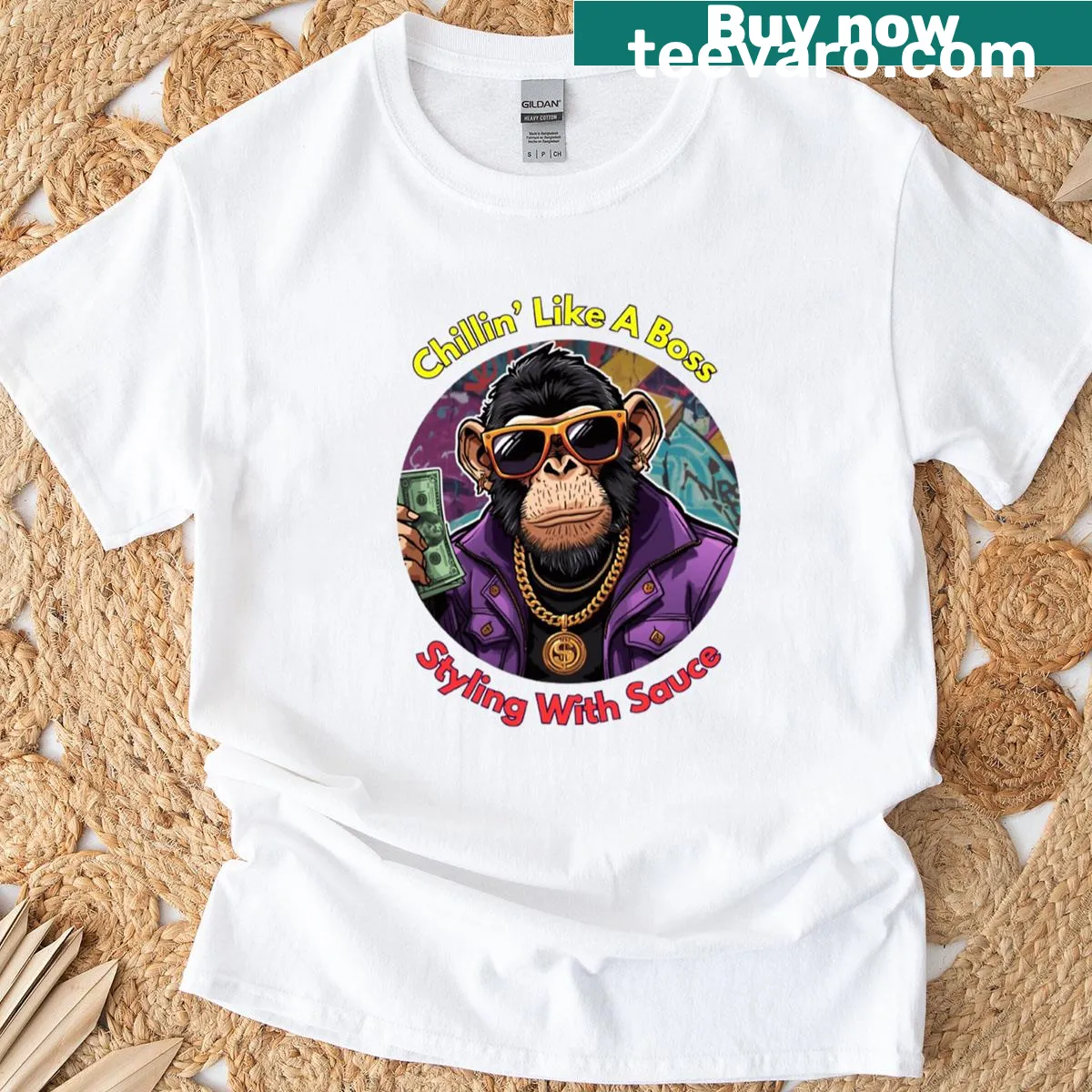 T-shirt featuring a cartoon chimp wearing a crown as a playful boss. — on a men's t-shirt