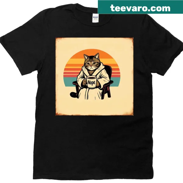 Retro oversized t-shirt with a sarcastic tabby cat and sunset