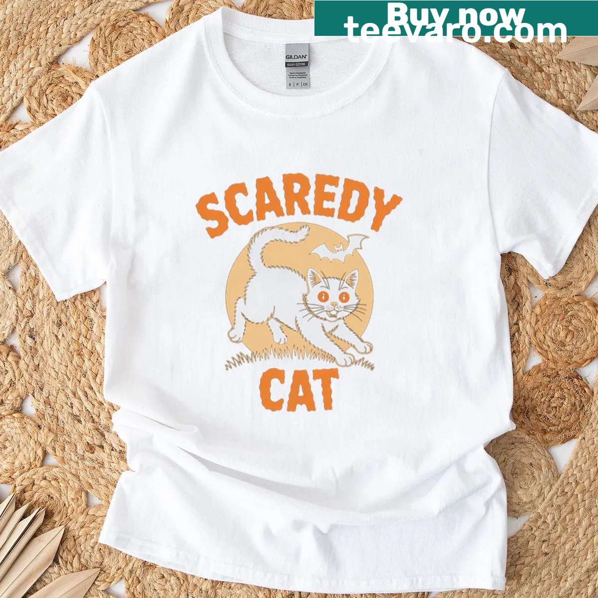 Vintage Halloween T-shirt featuring a cute black cat design. — on a men's t-shirt