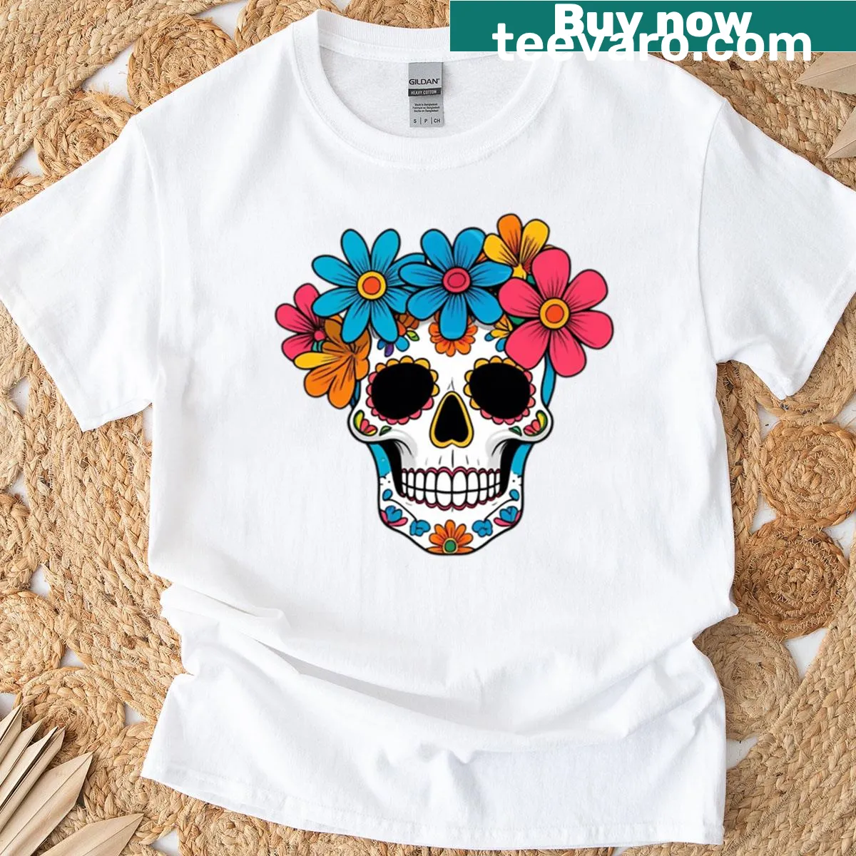 T-shirt featuring a skull surrounded by flowers illustration — on a men's t-shirt