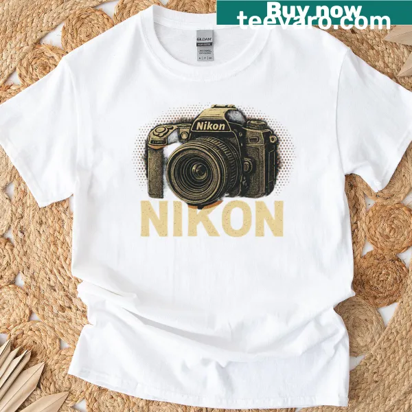 Vintage Nikon camera graphic on an oversized T-shirt, nostalgic style.