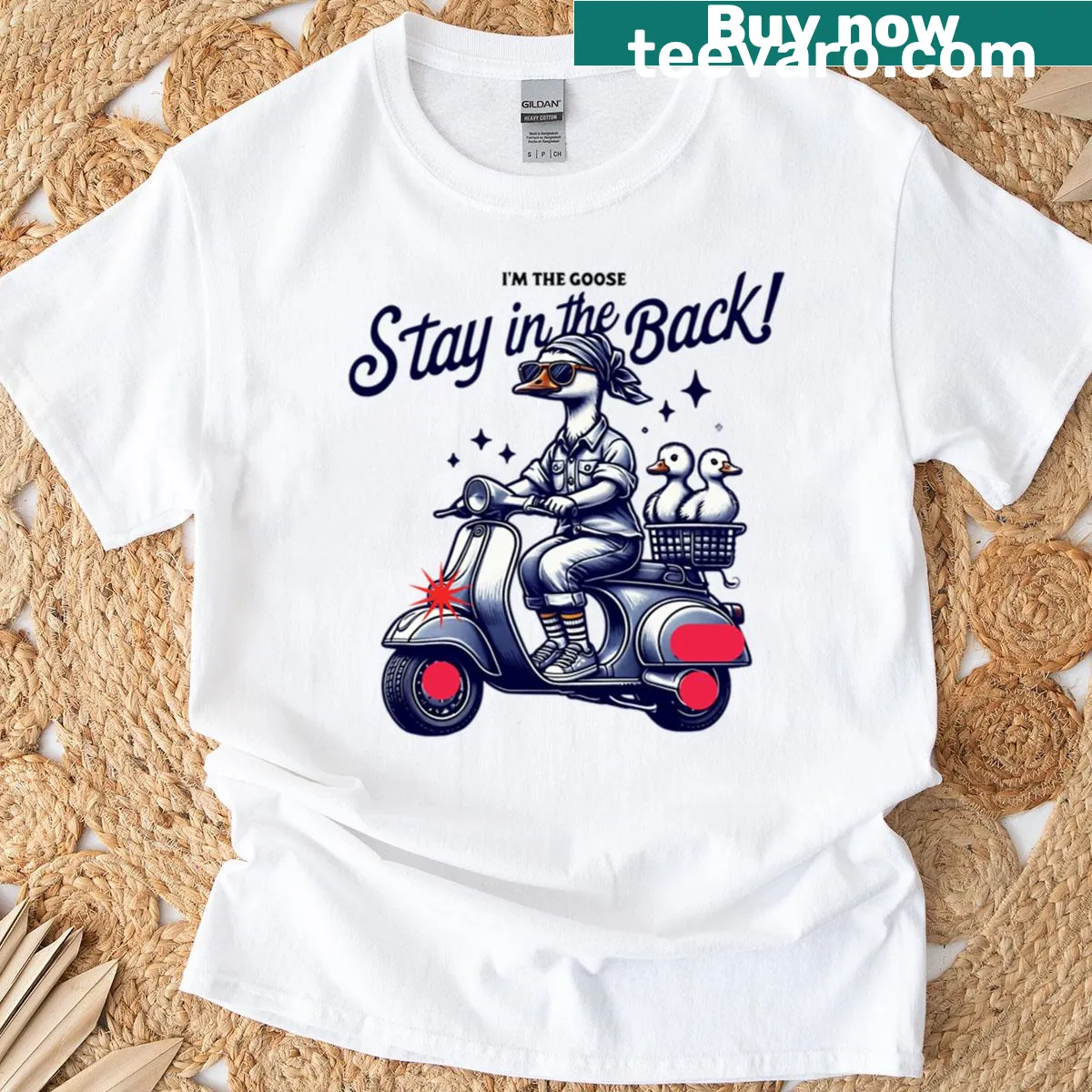 Whimsical T-shirt featuring a goose on a scooter with ducklings — on a men's t-shirt