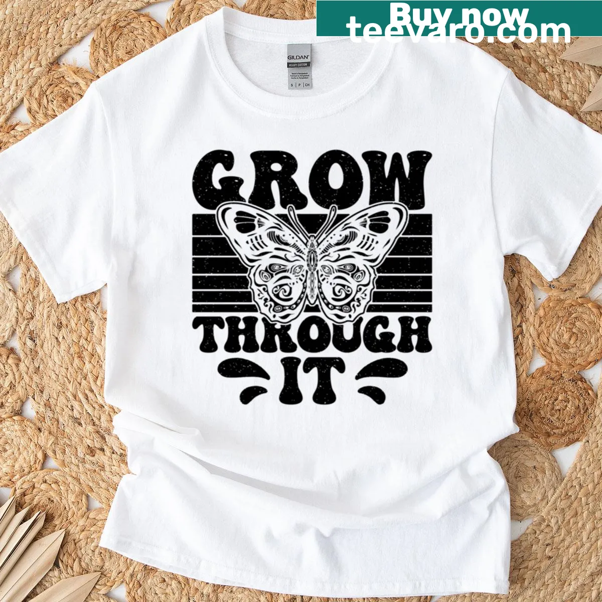 Oversized t-shirt featuring a butterfly and 'Grow Through It' phrase for nature lovers. — on a men's t-shirt