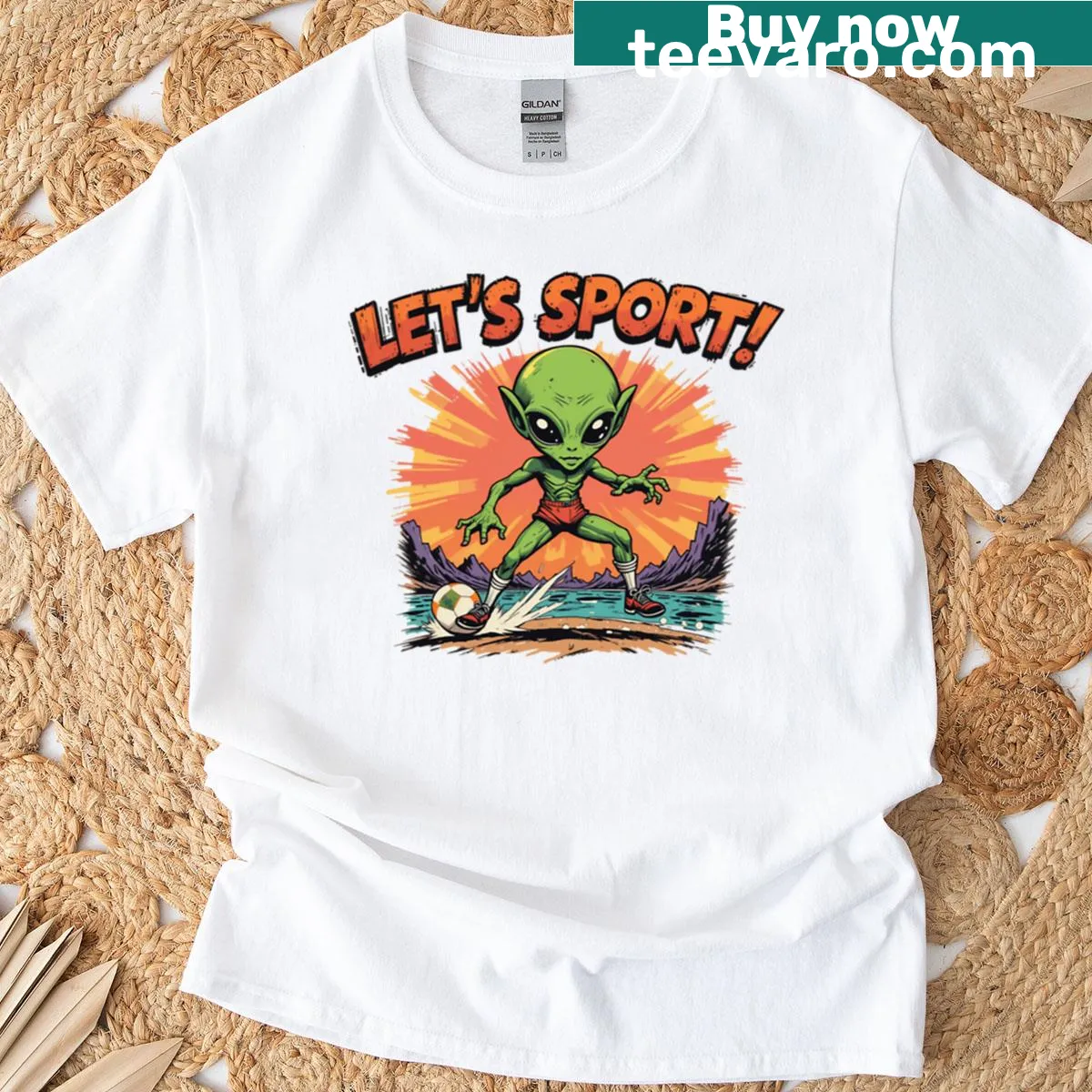 Playful T-shirt featuring a whimsical alien illustration — on a men's t-shirt