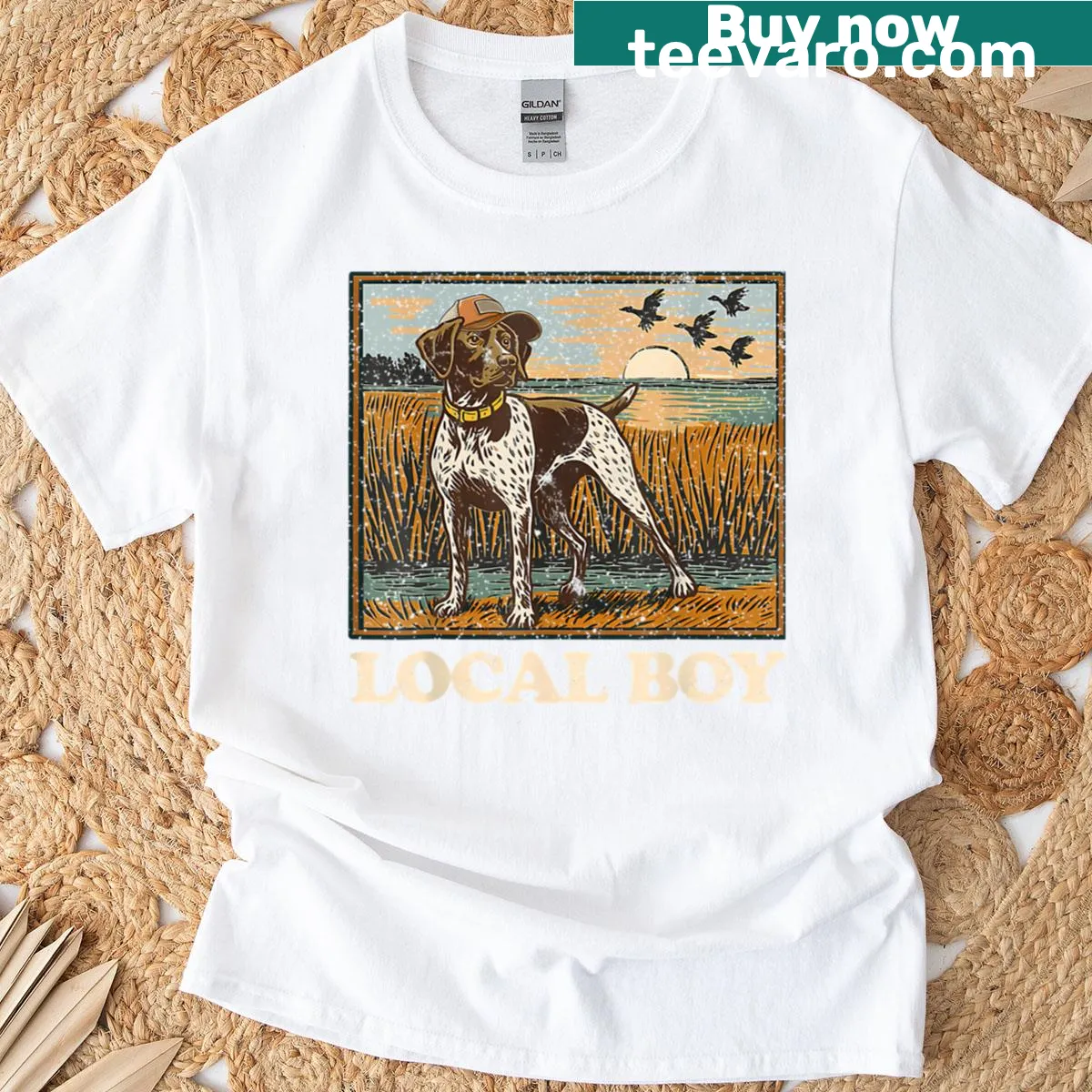 Vintage t-shirt depicting a black lab in a marsh scene — on a men's t-shirt