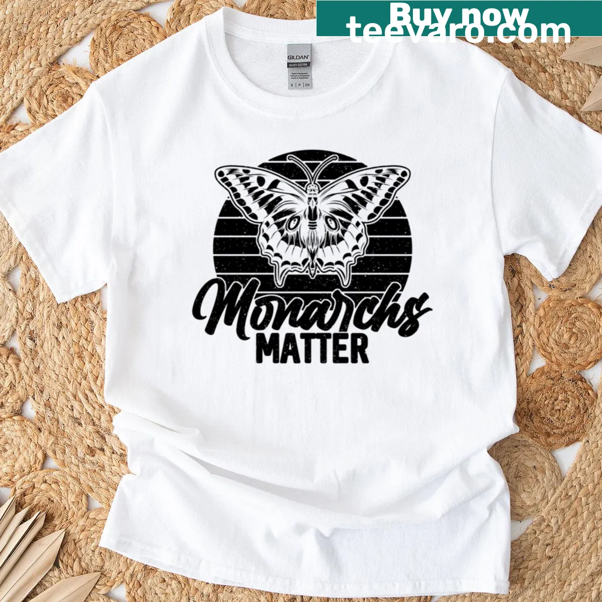 Illustrative T-shirt celebrating monarch butterflies and milkweed. — on a men's t-shirt