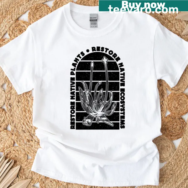 Oversized T-shirt featuring a milkweed and butterfly illustration